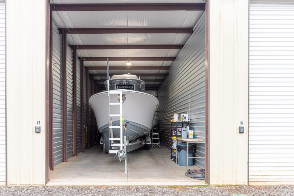 Covered boat storage units with high clearance and wide access